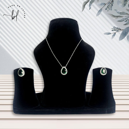 Rhodium Plated Studded Pendant & Earrings Set In Green & White Colour